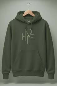 A person wearing an oversized modern pullover hoodie in a minimal colourway, hood up